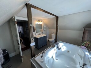 Jetted tub, hair dryer, towels, soap