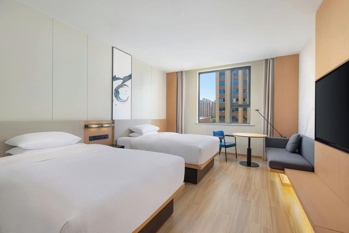 Standard Room, 2 Double Beds, City View | Minibar, in-room safe, blackout drapes, soundproofing