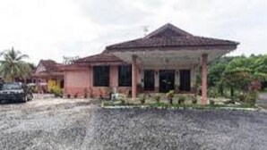 A single-story building with a tiled roof and a covered porch. - INB Resort Ayer Keroh Melaka (Malacca City)
