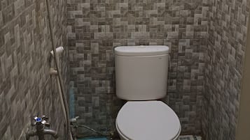Shower, rainfall showerhead, towels, soap