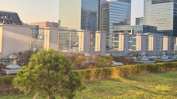 A modern building complex with multiple high-rise structures, featuring glass facades and contemporary architecture. - 27 l Myeongdong 5min l Airport bus l Cozy Room (Seoul)