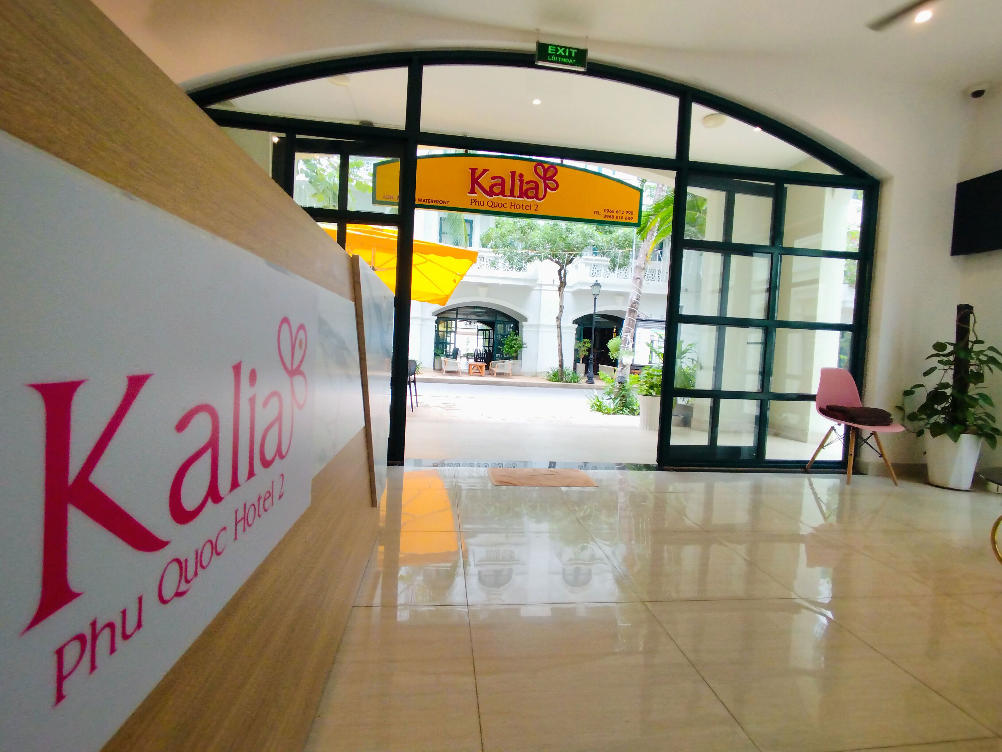 A hotel entrance with a sign for 'Kalia Phu Quoc Hotel 2'.