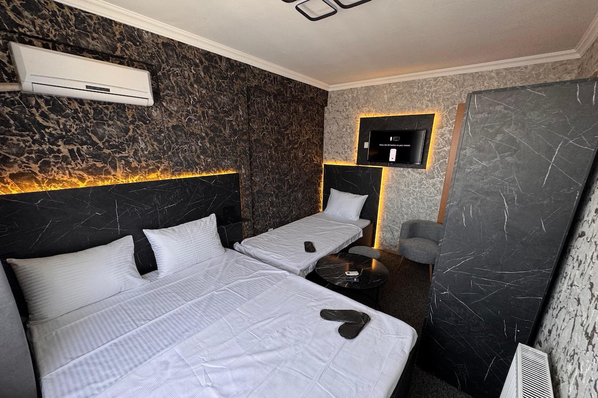 Family Triple Room | Desk, laptop workspace, free WiFi, bed sheets