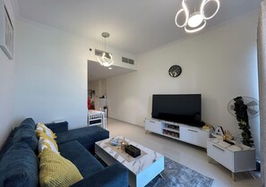 Comfort Apartment, 1 Bedroom, Golf View | Living area | 55-inch Smart TV with cable channels - Carson Tower Damac Hills by Bespoke (Dubai)