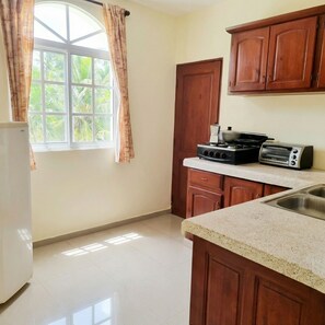 Fridge, stovetop, coffee/tea maker, toaster