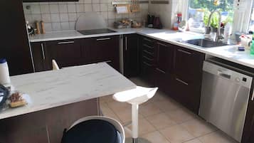 Fridge, microwave, cookware/dishes/utensils