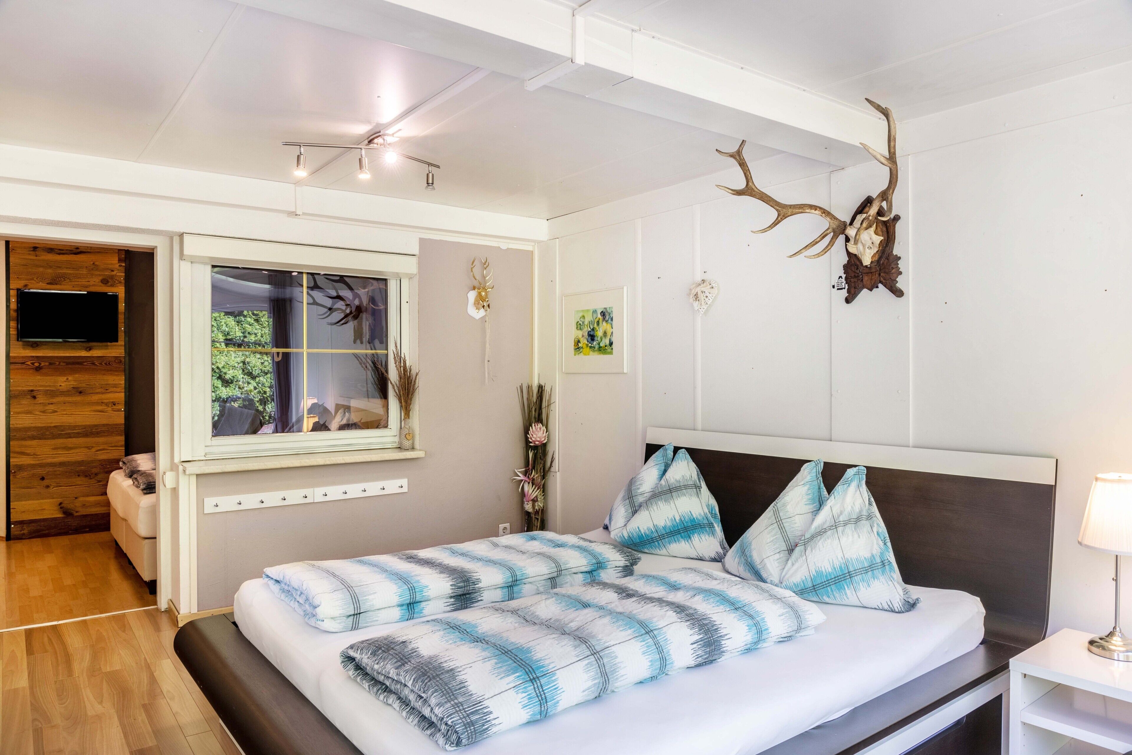 4 dormitorios, tabla de planchar con plancha, wifi gratis y ropa de cama