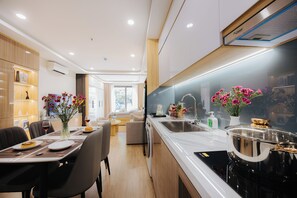Deluxe Double Room, Balcony, City View | Living area - Wisteria Luxury Apartment (Hanoi)