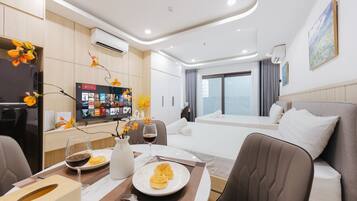 Family Apartment, Balcony | In-room dining