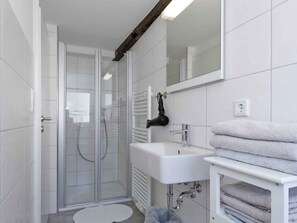 Shower, hair dryer, towels