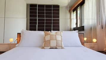 2 chambres, coffres-forts dans les chambres, fer et planche Ă repasser