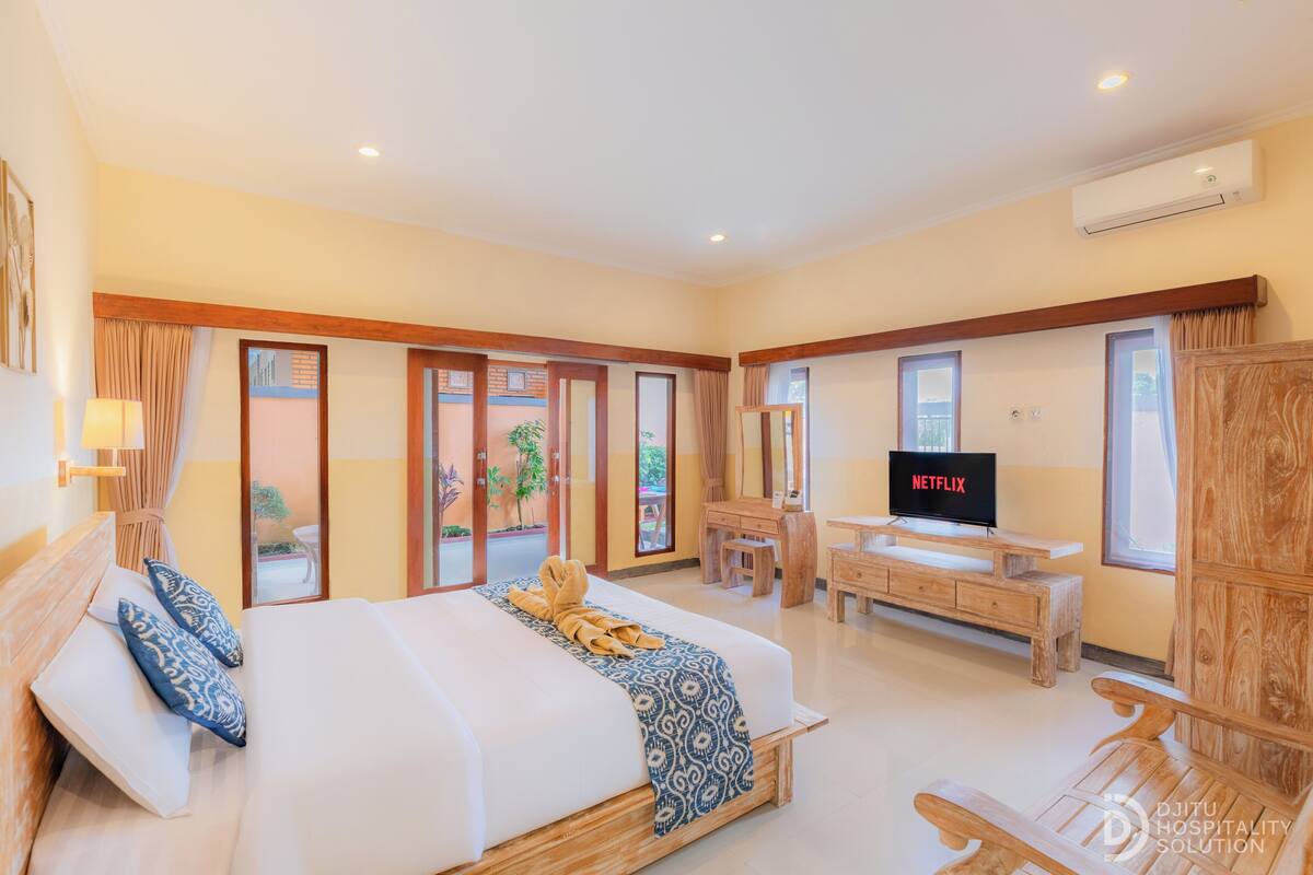Deluxe Room, Garden View | In-room safe, desk, laptop workspace, free WiFi