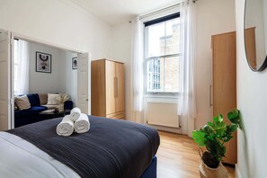 1 bedroom, desk, iron/ironing board, travel cot