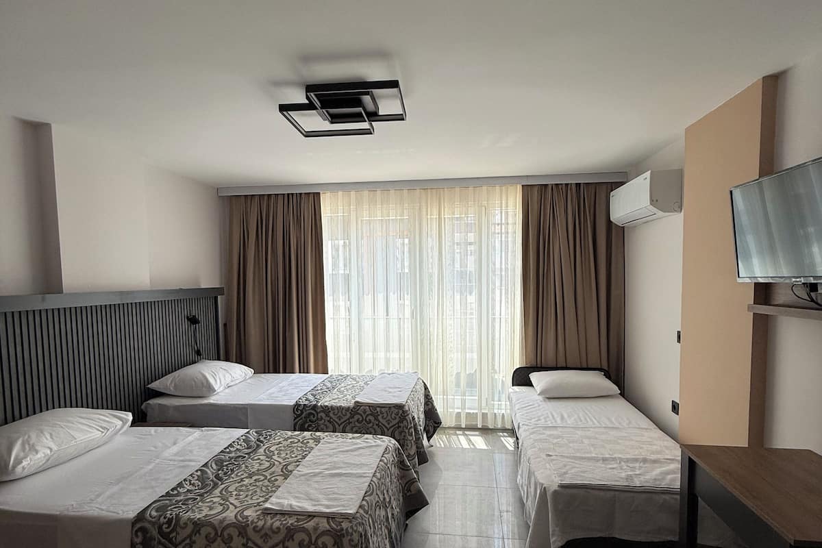 Premium trippelrum | Allergitestade sängkläder, Tempur-Pedic-madrasser och gratis wi-fi