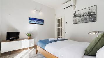 2 dormitorios, tabla de planchar con plancha, wifi gratis y ropa de cama