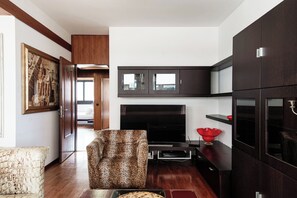 Deluxe-Apartment, Balkon | Wohnbereich