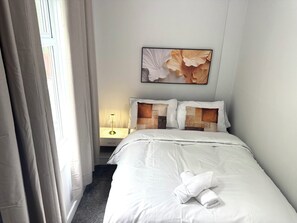 2 quartos, ferros/tábuas de passar roupa, Wi-Fi, roupa de cama