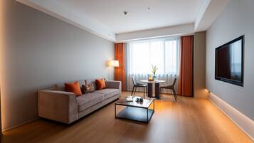 Premium bedding, down duvets, pillow-top beds, free minibar