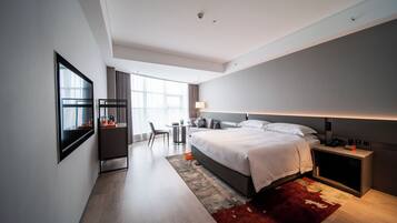 Premium bedding, down duvets, pillow-top beds, free minibar