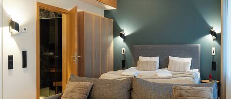 Deluxe-Zimmer, Sauna | Verdunkelungsvorhänge, schallisolierte Zimmer, Bügeleisen/Bügelbrett