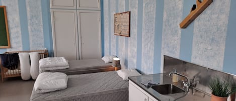 Family Room, Multiple Beds, Non Smoking, Garden View | Laptop workspace, free WiFi