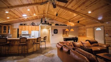 Signature Cabin, 3 Bedrooms, Non Smoking, Kitchen | Living room | 45-inch Smart TV with cable channels, foosball
