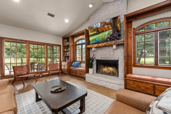 TV, fireplace, books, offices