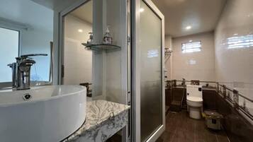 Shower, hair dryer, towels, soap