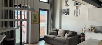 Open-plan loft overlooking Lake Como with private parking space