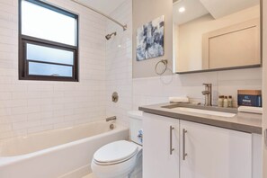 Shower, hair dryer, towels