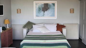 1 habitación, tabla de planchar con plancha, cuna de viaje y wifi