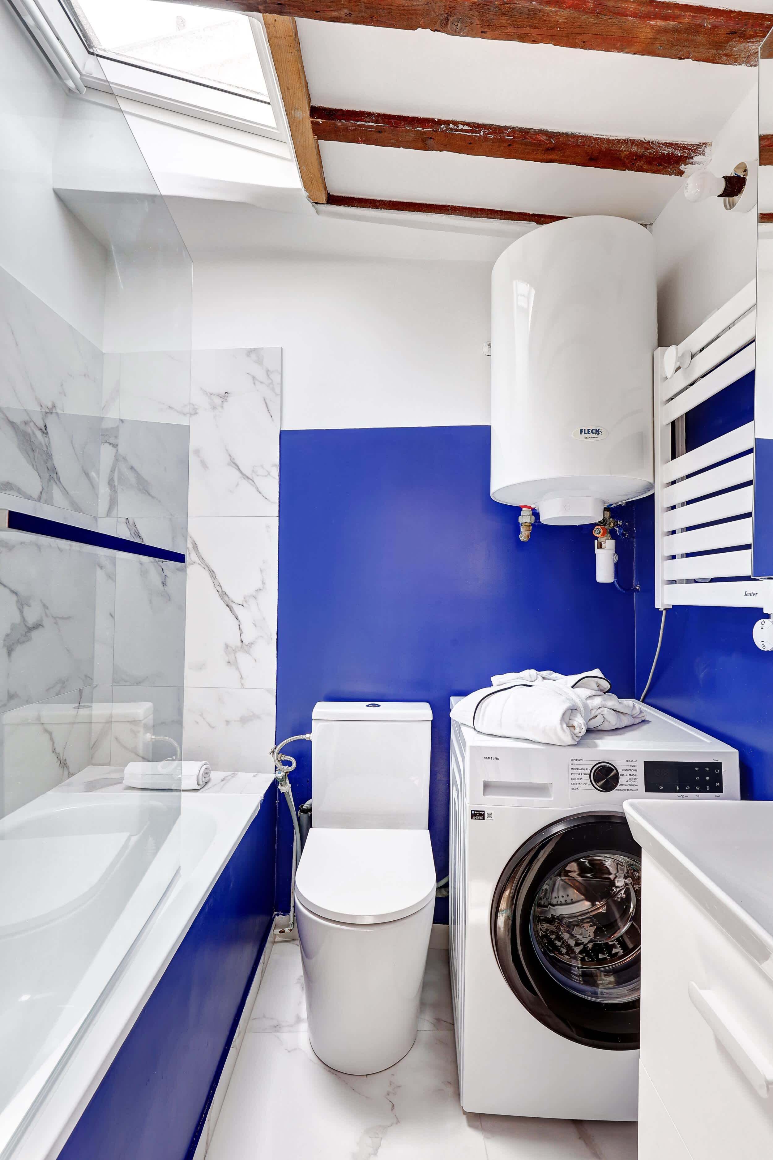 Shower, hair dryer, towels