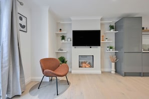 Departamento, 2 habitaciones | Área de sala de estar