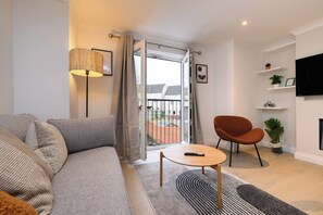 Departamento, 2 habitaciones | Área de sala de estar