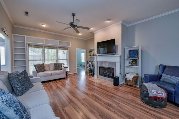 Smart TV, fireplace, books