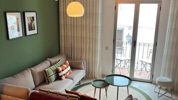 Apartamento, vistas a la ciudad | Zona de estar