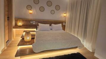 3 室のベッドルーム、セーフティボックス (室内)、アイロン / アイロン台、旅行用ベビーベッド