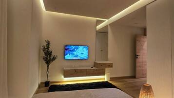 3 chambres, coffres-forts dans les chambres, fer et planche à repasser