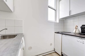 Microwave, stovetop, coffee/tea maker, electric kettle