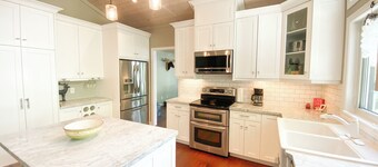 Newly Offered: Sandy Beach Kayaks SUPs Canoes Firepit Beautiful Indoor Spaces