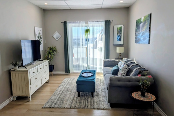 Relax in comfort after a day at the beach! Have your morning coffee on the deck