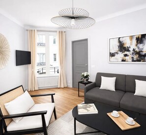 Standard Apartment, Courtyard View | Living area | 80-cm Smart TV with digital channels - 1611 Vouillé (Paris)