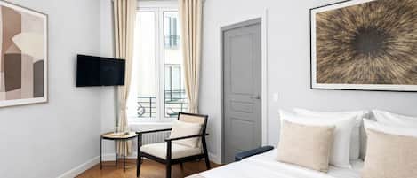 Laptop workspace, iron/ironing board, travel cot, free WiFi