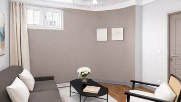 Apartamento estándar, vistas al patio | Zona de estar | Smart TV de 80 cm con canales digitales