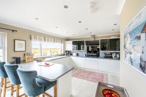 Microwave, dishwasher, coffee/tea maker, high chair