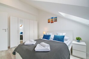 Departamento, balcón, vista a la ciudad | Tabla de planchar con plancha