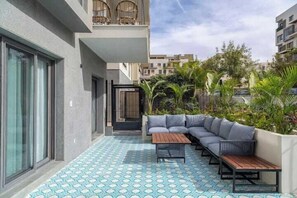 Basic House, Patio, Courtyard View | Terrace/patio - Rivera 2bedroom with Garden Eastown near EDNC Mall (New Cairo)