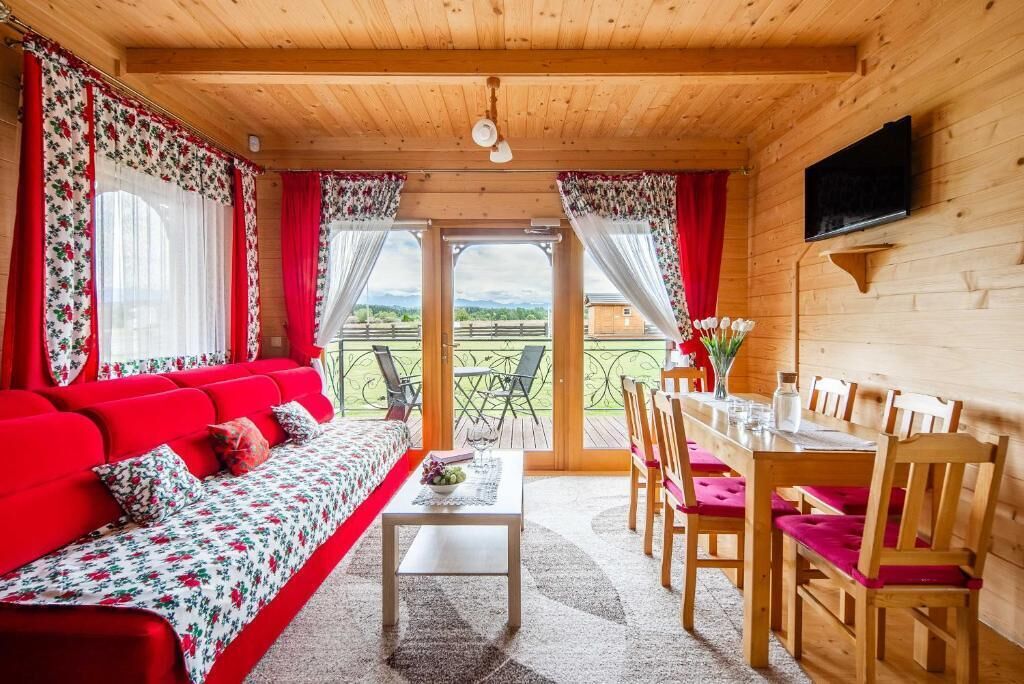 Deluxe Chalet, Mountain View | Living area | Smart TV, fireplace