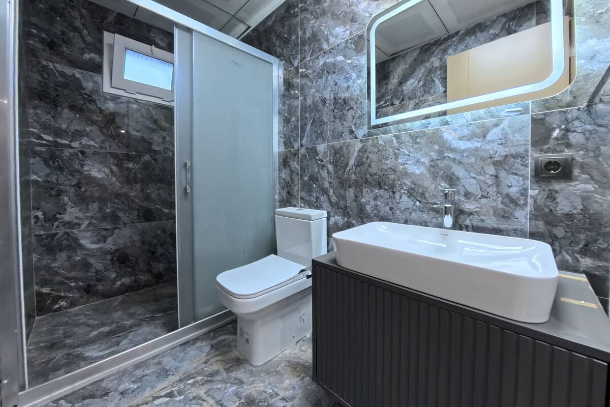 Bathroom | Shower, hair dryer, slippers, towels