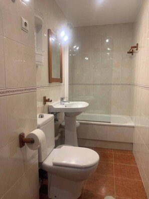 Hair dryer, towels, soap, toilet paper